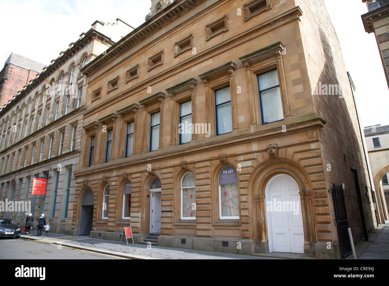 Antigua biblioteca stirlings fachada en edificio restaurado ahora apartamentos de lujo en Merchant City Glasgow Scotland Reino Unido Foto de stock