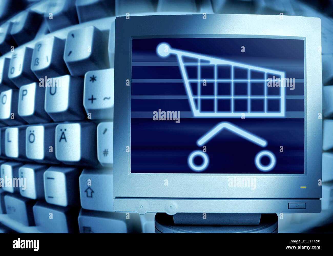 Teclado y compras - und mit Einkaufswagensymbol Computertastatur Monitor Foto de stock