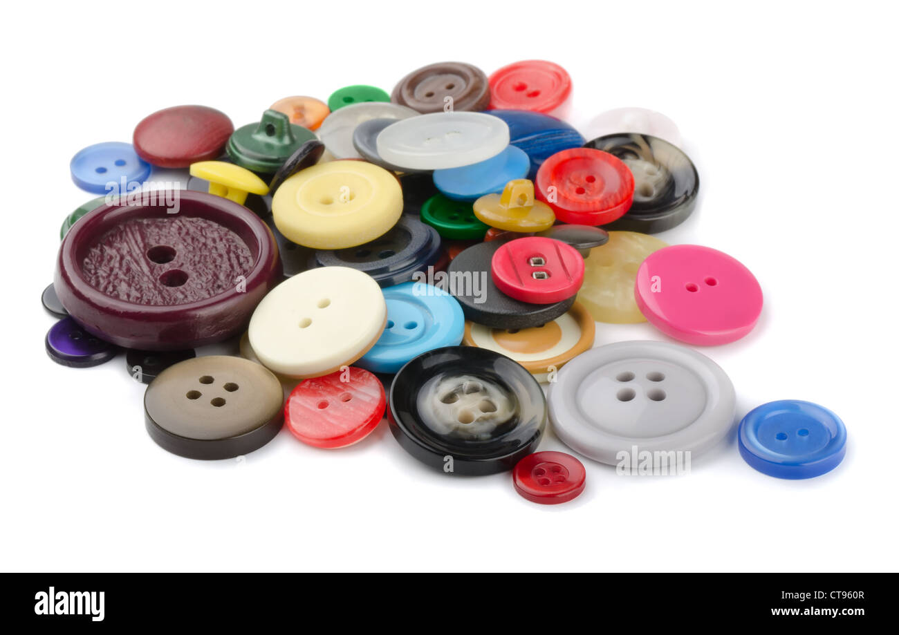 Montón de cosiendo botones aislado en blanco Foto de stock