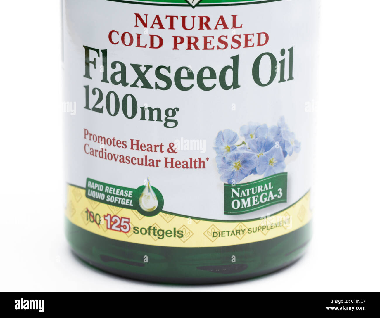 El aceite de linaza frasco de píldoras, una fuente nutricional de ácidos grasos omega-3 y omega-6 Foto de stock