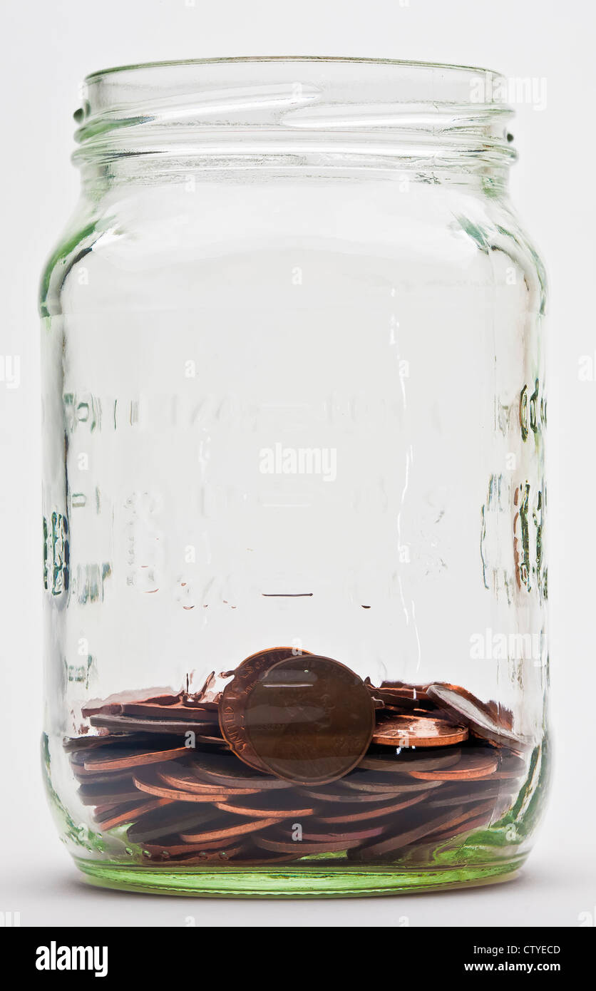 Un cuarto lleno de jar centavos de dólar Foto de stock