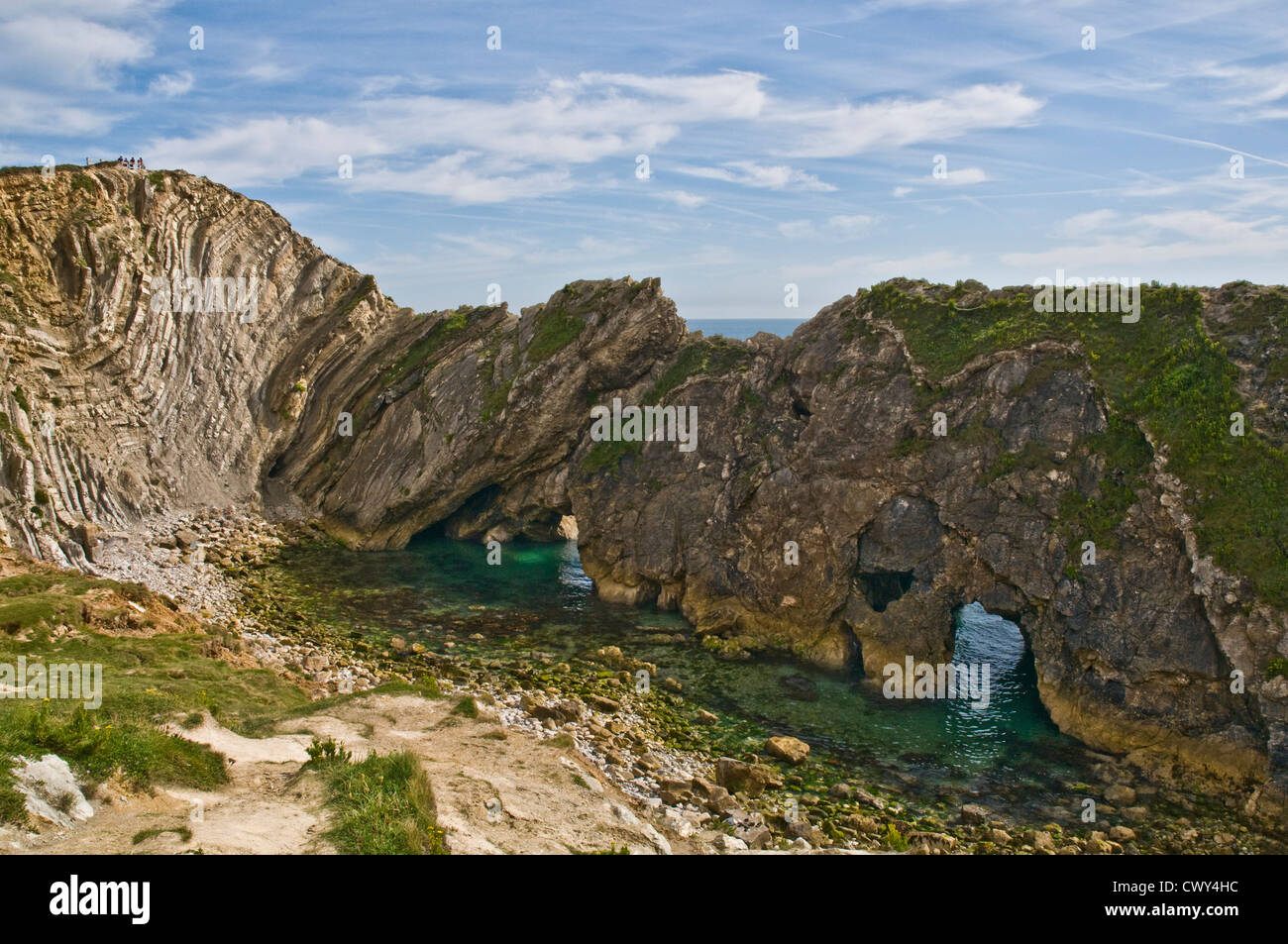 Orificio de escalera costa de Dorset acantilados Lulworth Cove mostrando Geología Foto de stock