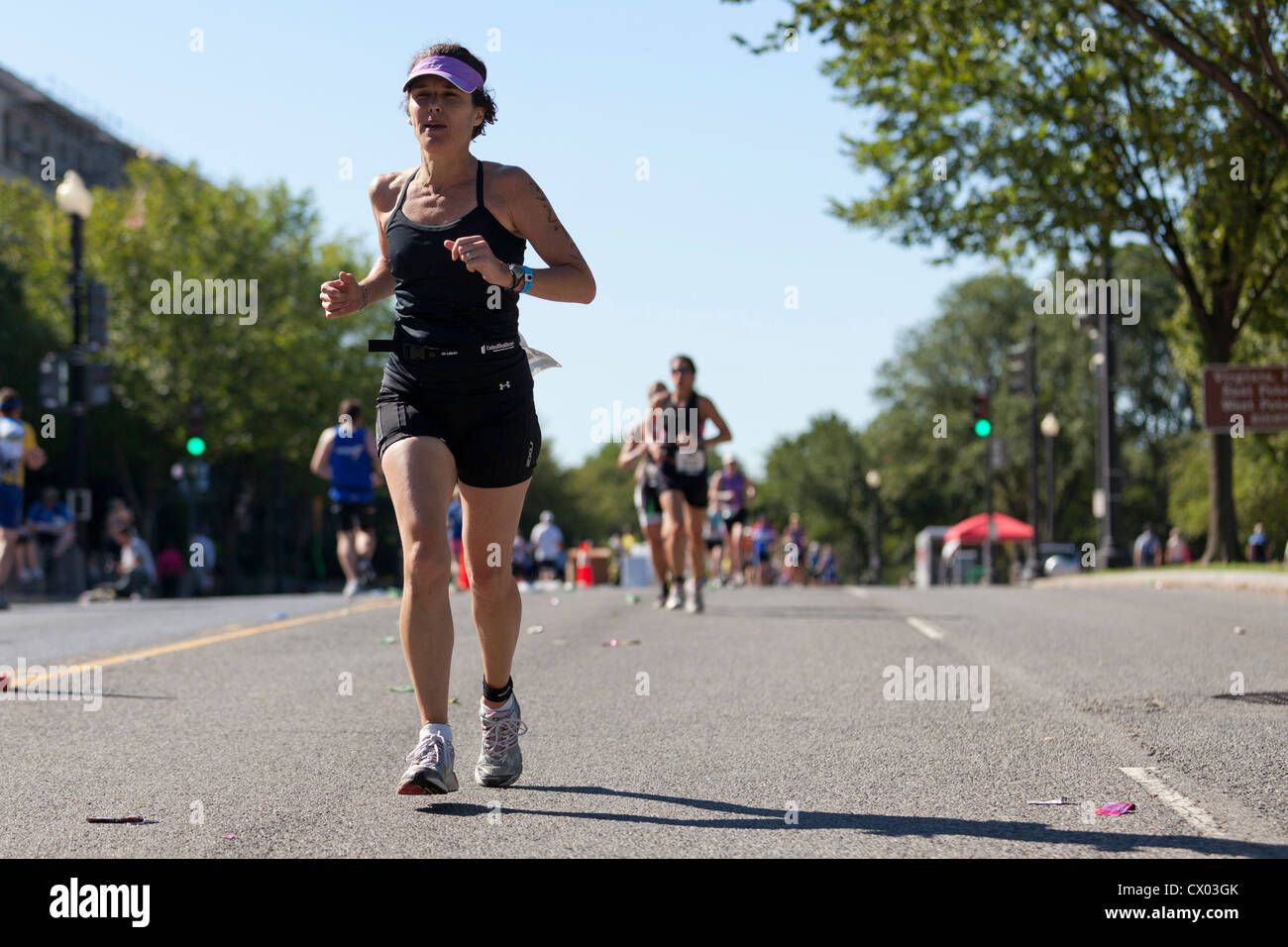 Racer corriendo una maratón Foto de stock