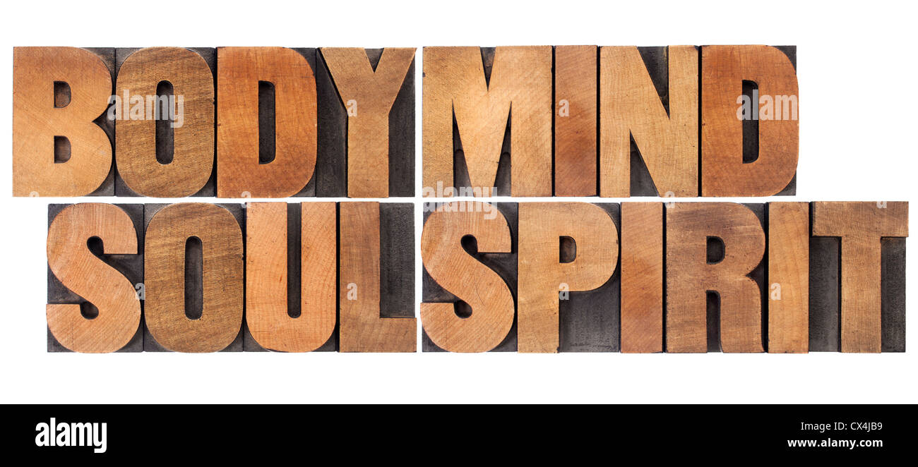El cuerpo, la mente, el alma y el espíritu, un collage de palabras aisladas en vintage tipografía bloques de madera Foto de stock