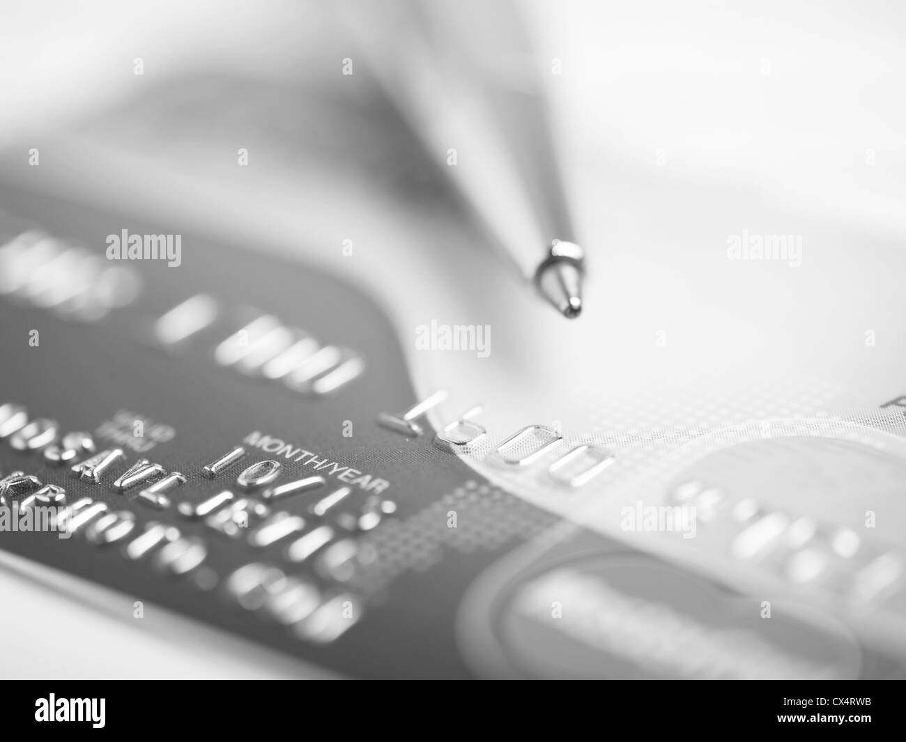 Cerrar una tarjeta de crédito y la pluma Foto de stock