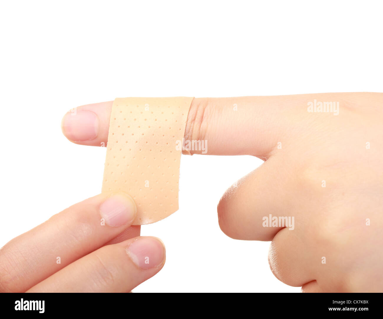 Primer plano de manos de mujer con Band-aid, sobre fondo blanco. Foto de stock