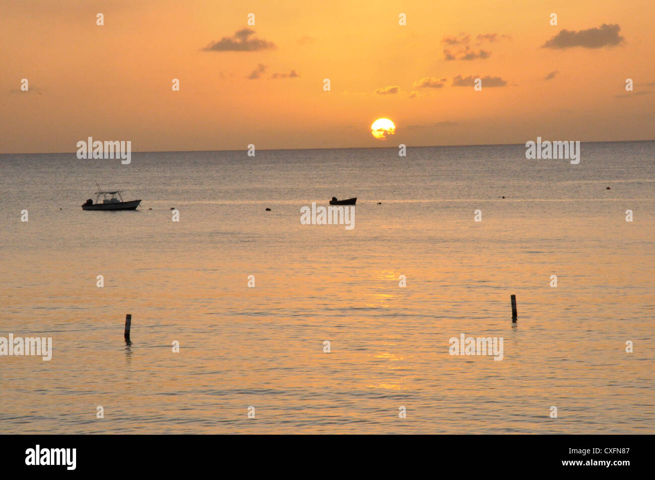 Barbados, puesta de sol, mar, vacaciones mar reflejado Foto de stock