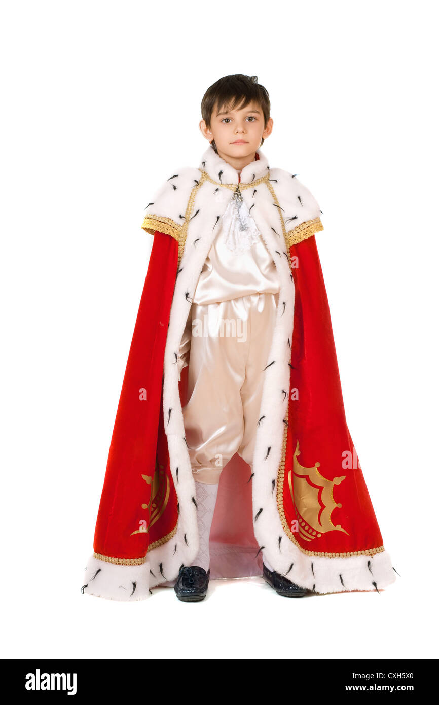 Niño vestido con un traje de rey Foto de stock