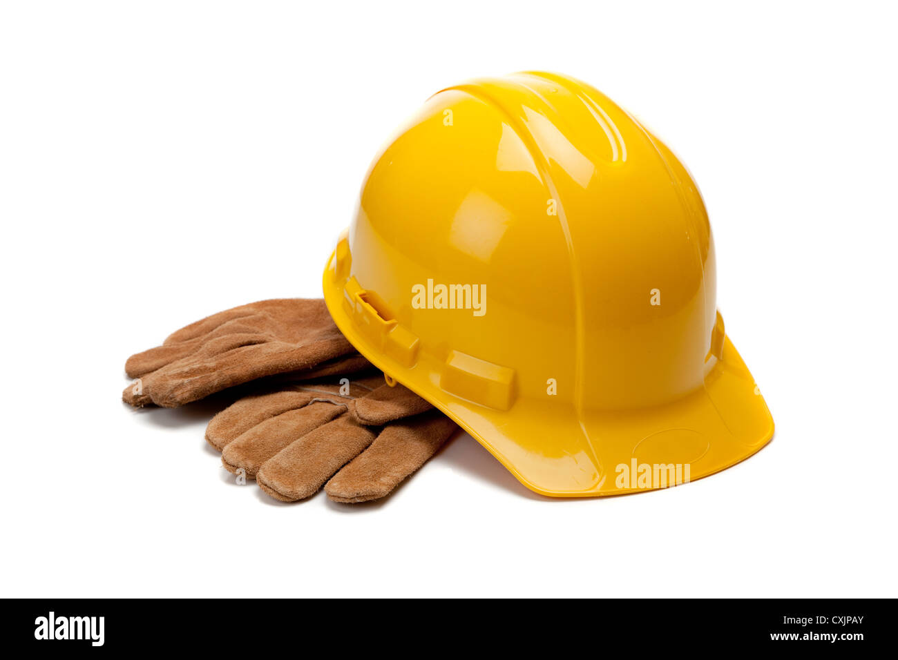 La construcción del casco y guantes de trabajo de cuero sobre un fondo blanco. Foto de stock