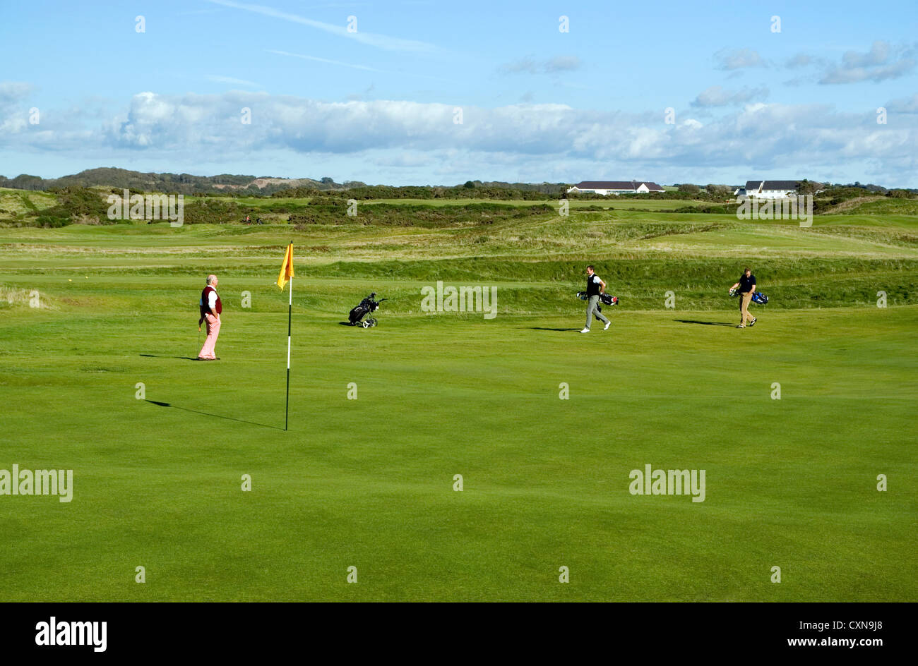 Los golfistas, el campo de Golf Royal Porthcawl, Gales del Sur, Reino Unido. Foto de stock