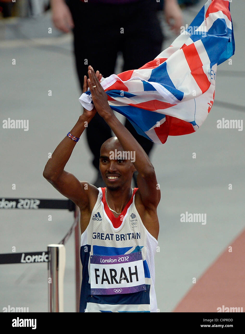 Britain's Mohamed Farah celebra. Foto de stock