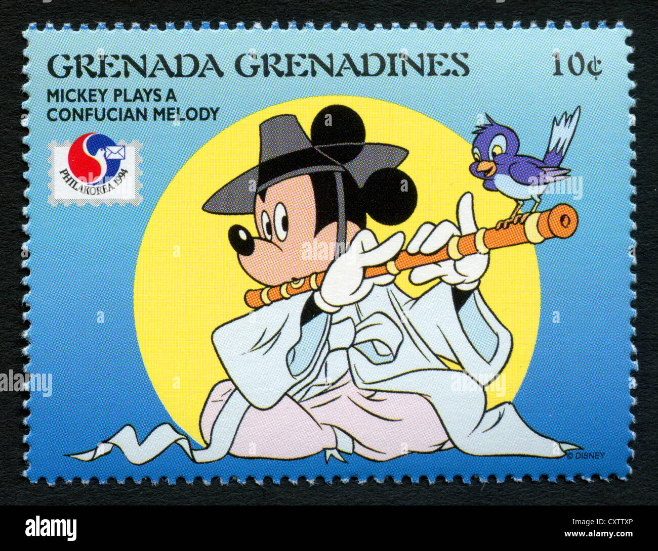 Sello de granada - personajes de dibujos animados de Disney - Mickey Mouse  desempeña una melodía de Confucio Fotografía de stock - Alamy