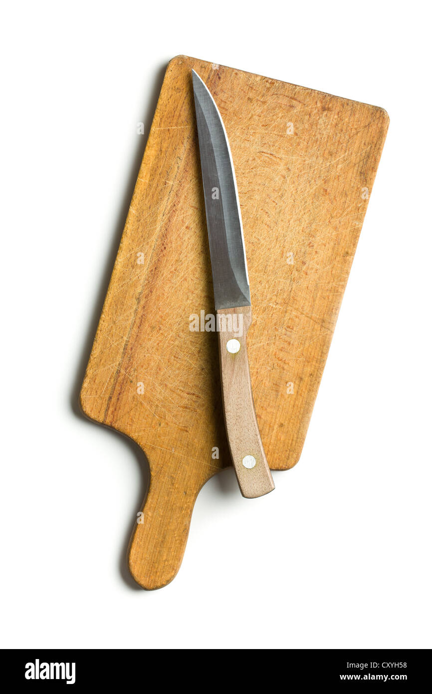 Cocina tabla de cortar con un cuchillo sobre fondo blanco. Foto de stock