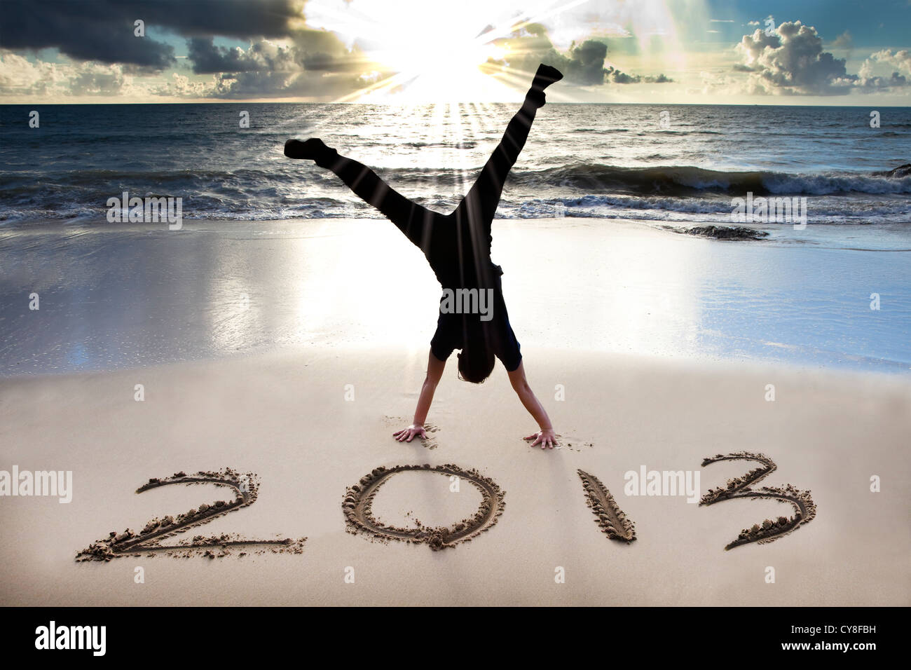 Feliz año nuevo 2013 en la playa Foto de stock