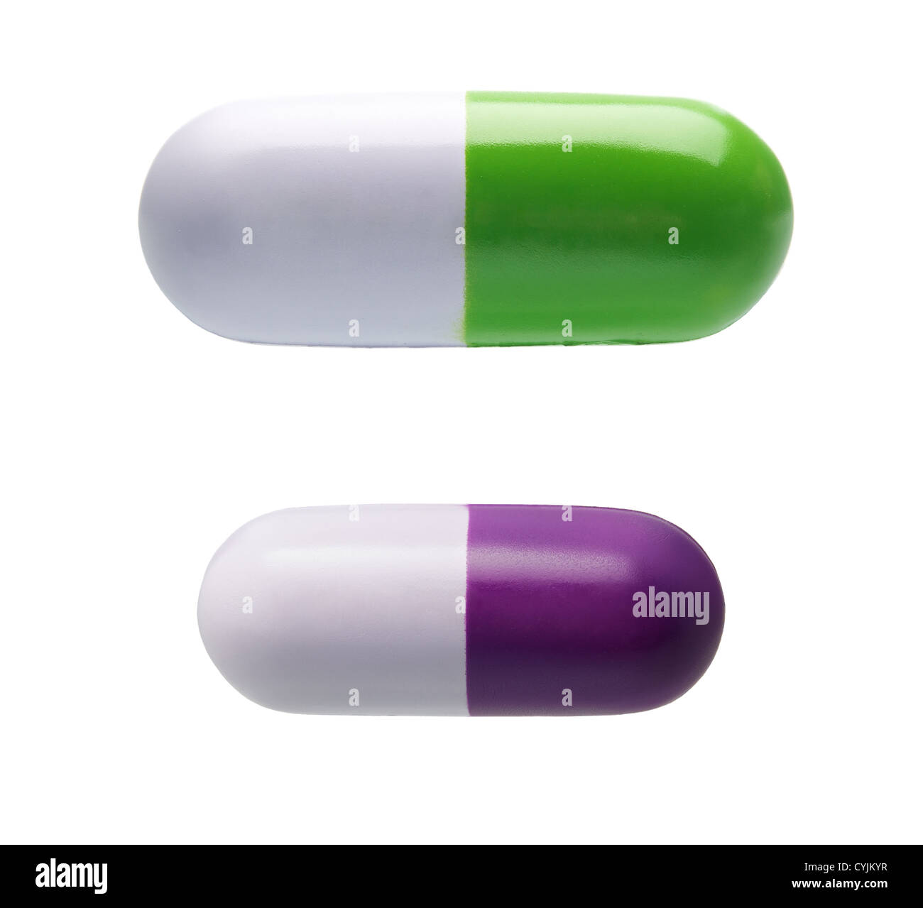 Dos en forma de píldora juguetes anti-estrés aislado sobre fondo blanco. Foto de stock