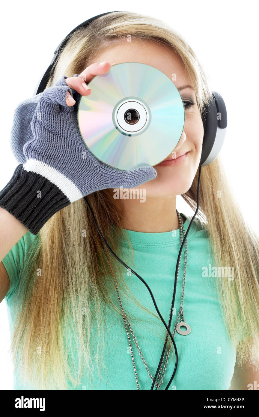 Adolescente en auriculares urbanos celebración cd sobre blanco Fotografía  de stock - Alamy
