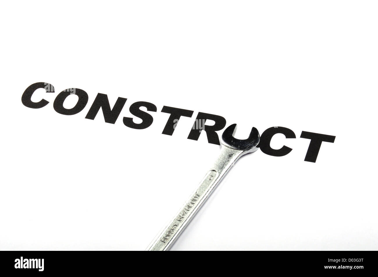 Construir o concepto de construcción con la herramienta y la palabra Foto de stock