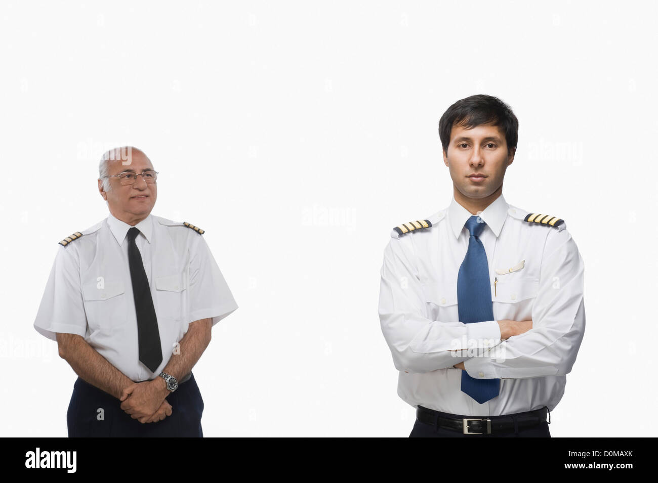 Dos pilotos mostrando diferentes expresiones faciales Foto de stock