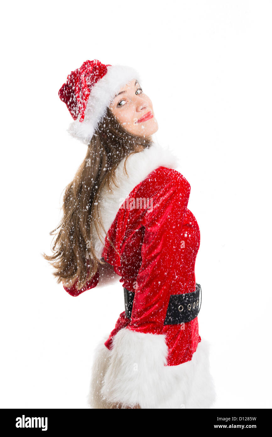 Feliz hermosa mujer vestida con traje de Papá Noel y la nieve cayendo sobre  ella sobre fondo blanco Fotografía de stock - Alamy