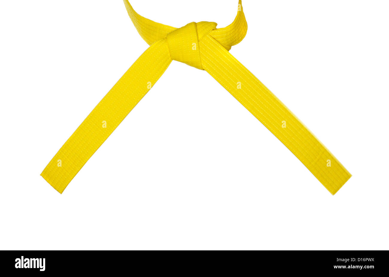 Cinturón amarillo de karate atado atado en un nudo Fotografía de stock -  Alamy