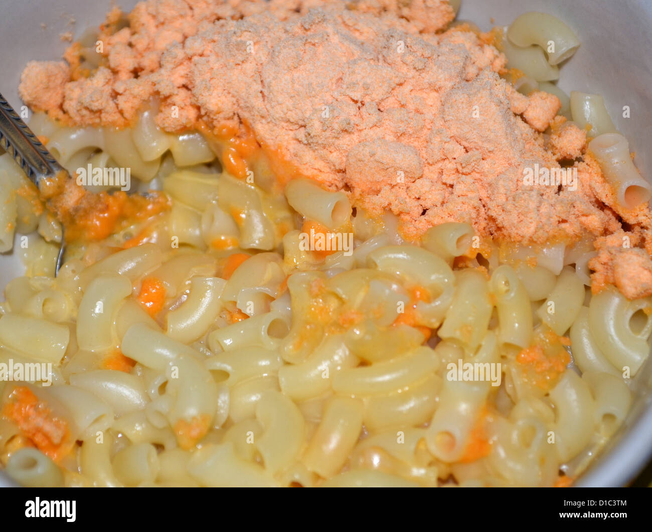Pasta de macarrones con queso en polvo mezcla puro Foto de stock