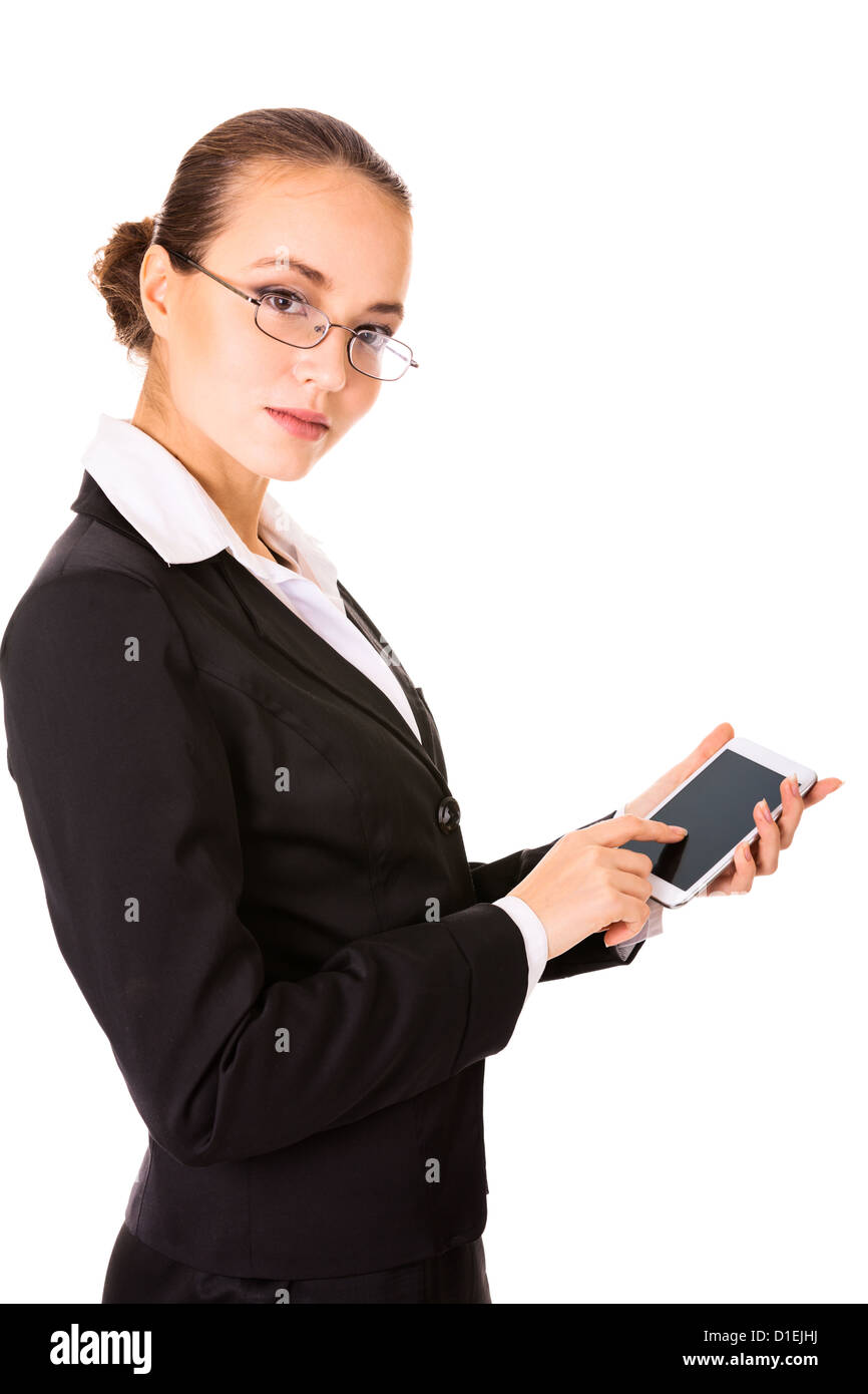 Mujer de negocios serios con un moderno toque de teléfono aislado sobre fondo blanco. Foto de stock
