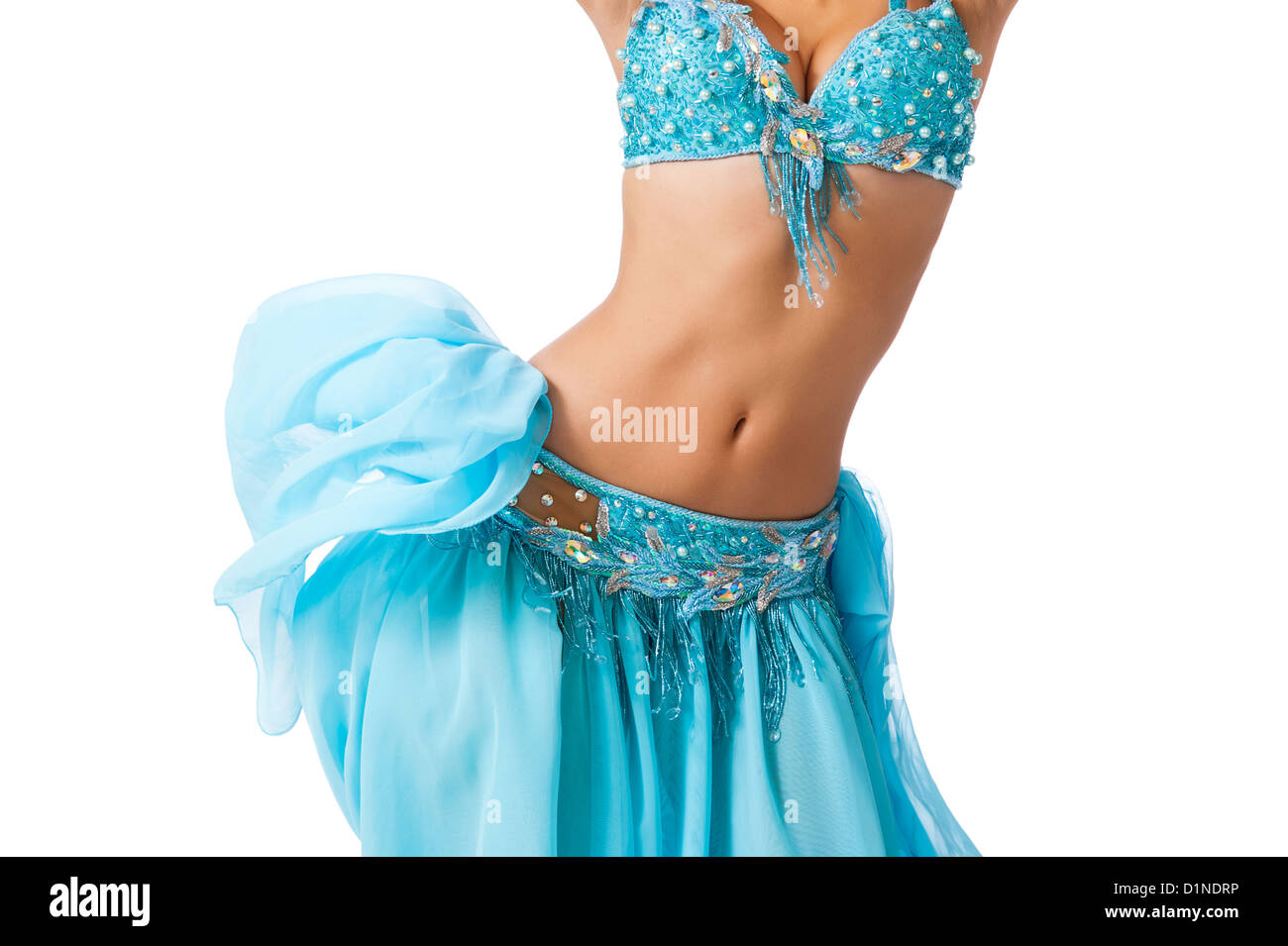 Bailarina de danza del vientre en un traje azul claro sacudiendo sus  caderas Fotografía de stock - Alamy
