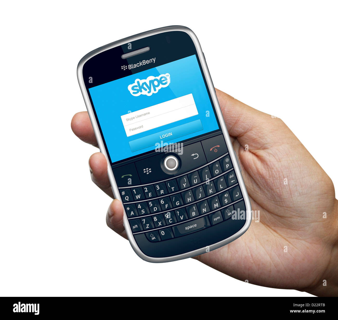Una persona que tenga un teléfono inteligente Blackberry 9000 aislado en fondo blanco. Foto de stock