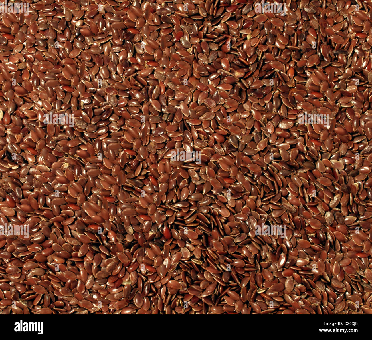 La semilla de lino de cereales de grano y textura como un símbolo de la  alimentación saludable por la creciente y comer fibra de alta marrón linaza  orgánica como una salud simpático