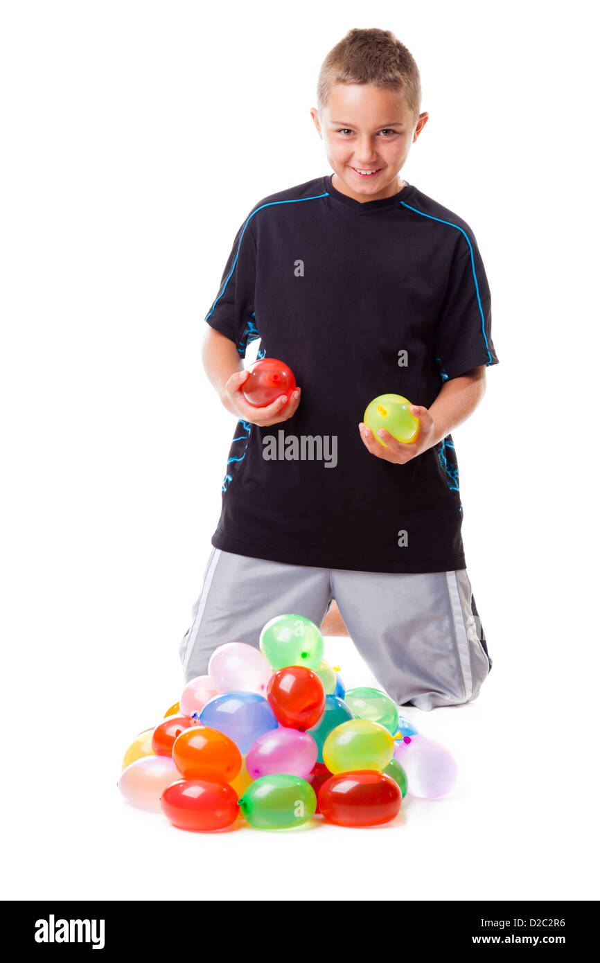 Niño con globos de agua Foto de stock