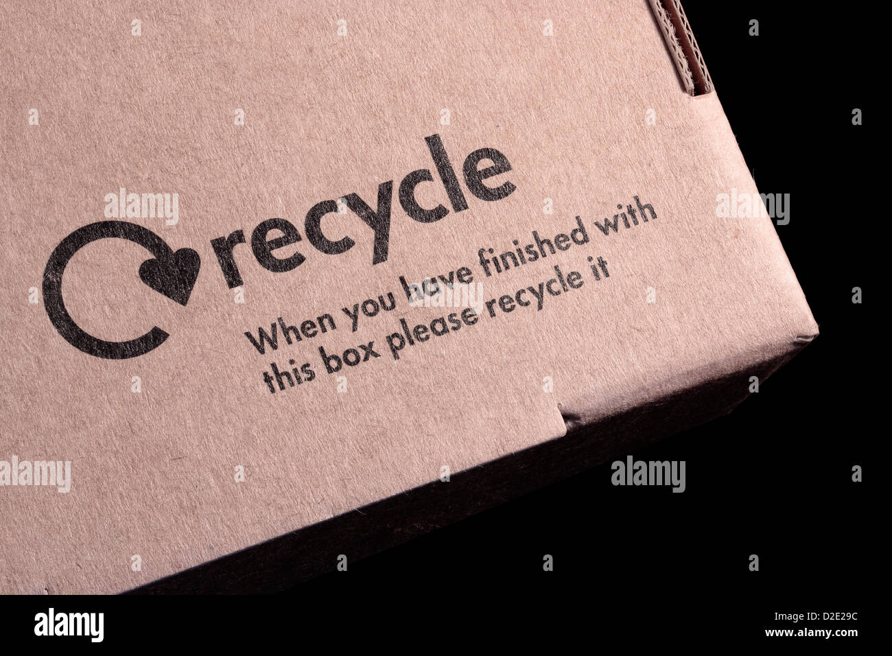 Símbolo de reciclaje de cajas de cartón y el mensaje cuando haya terminado con este cuadro por favor recíclelo Foto de stock