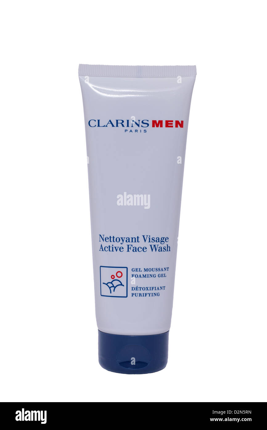 Un tubo de hombres Clarins nettoyant visage active face wash gel sobre un fondo blanco. Foto de stock