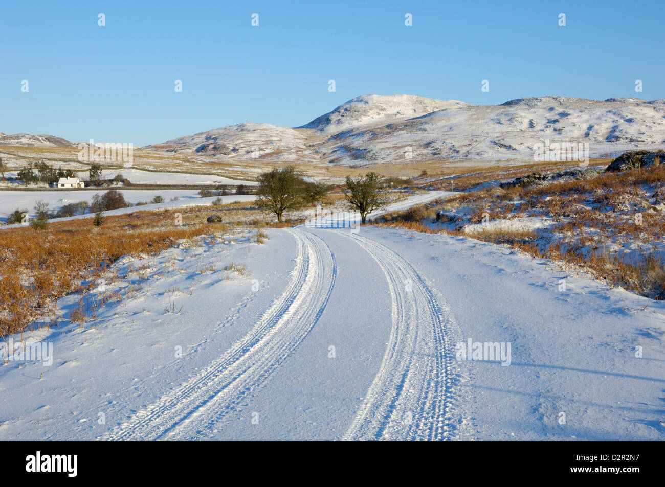 Carretera en invierno la nieve, Dumfries y Galloway, Escocia, Reino Unido, Europa Foto de stock