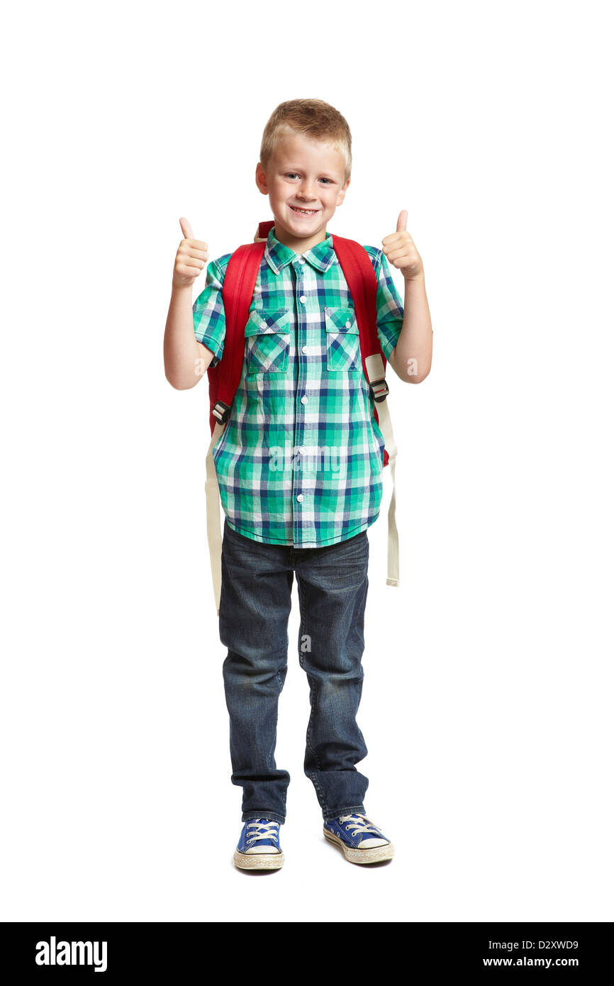 Niño de año de edad escolar con pulgares hacia y la sobre blanco Fotografía de stock - Alamy