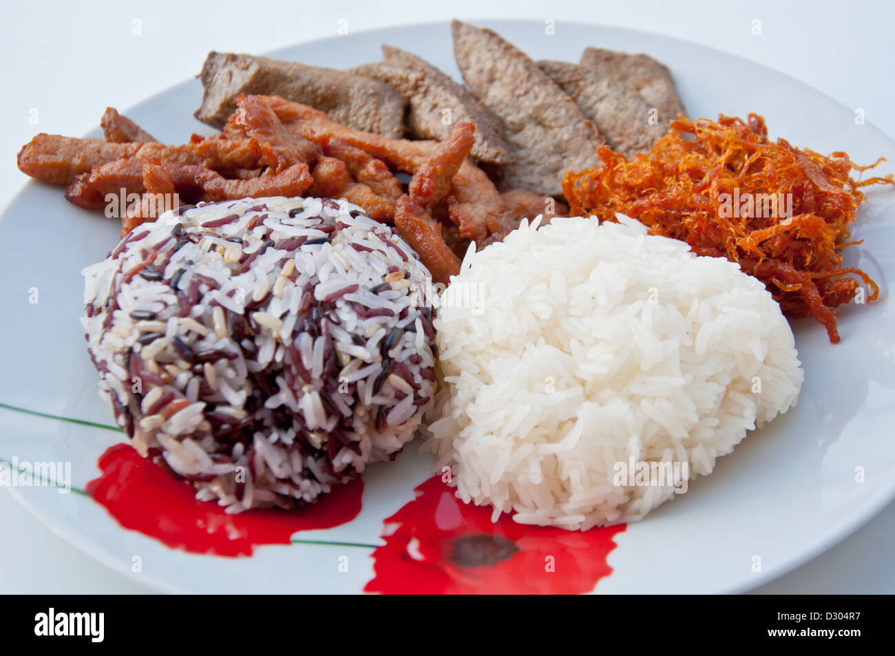 Carne de cerdo con arroz pegajoso para alimentos Foto de stock