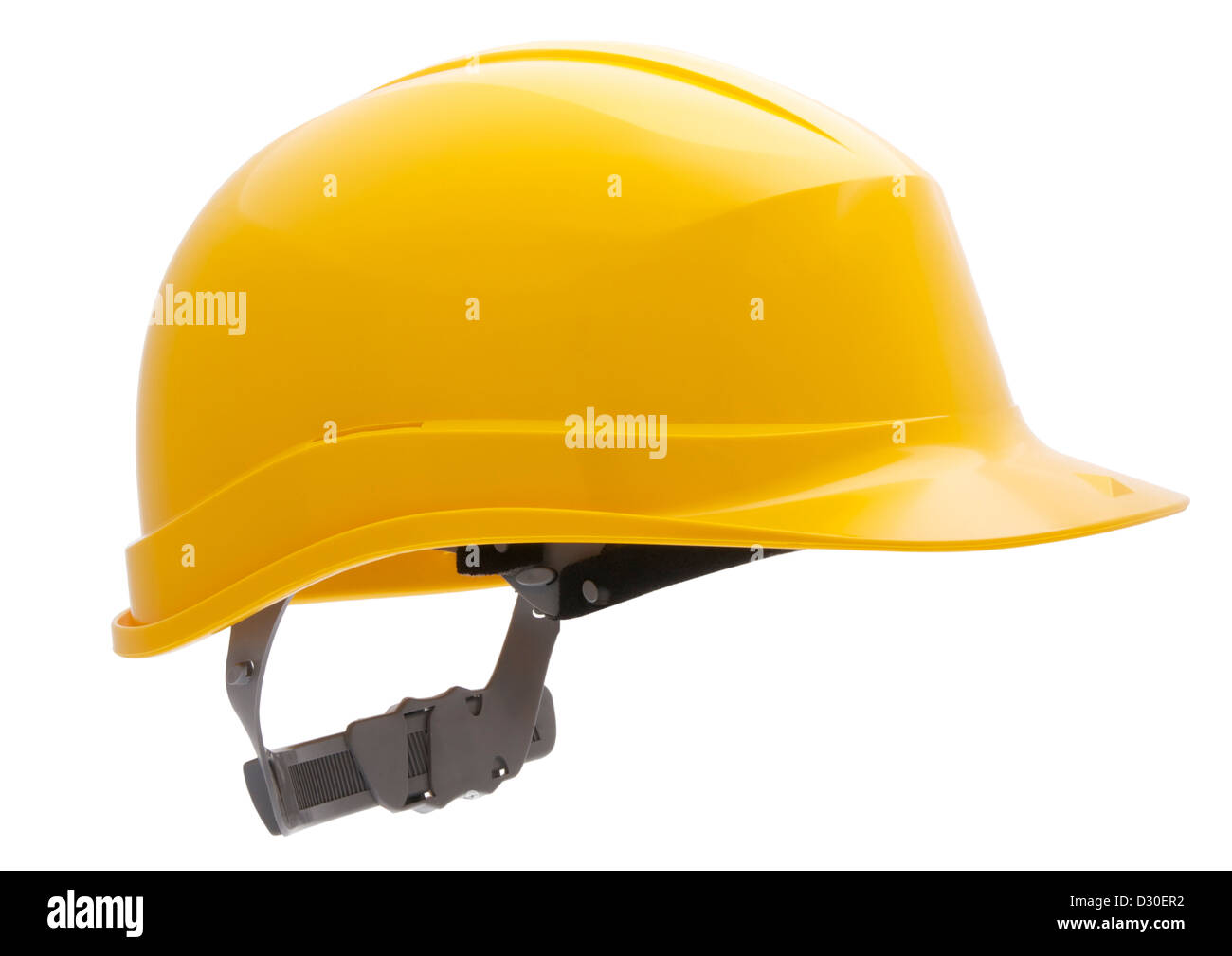 Casco de seguridad casco amarillo sobre fondo blanco. Foto de stock