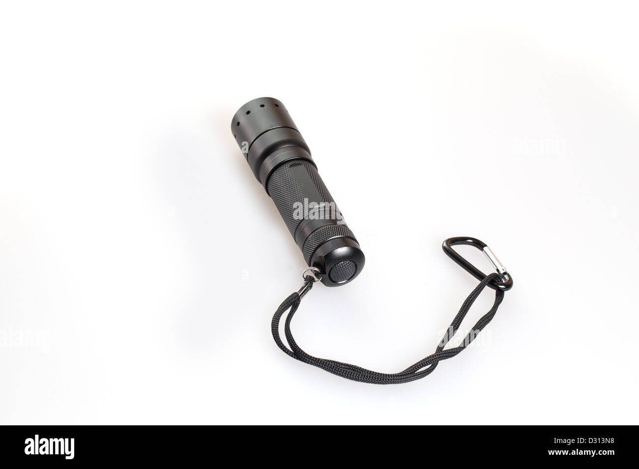 Mini Linterna de bolsillo aislado en blanco Foto de stock