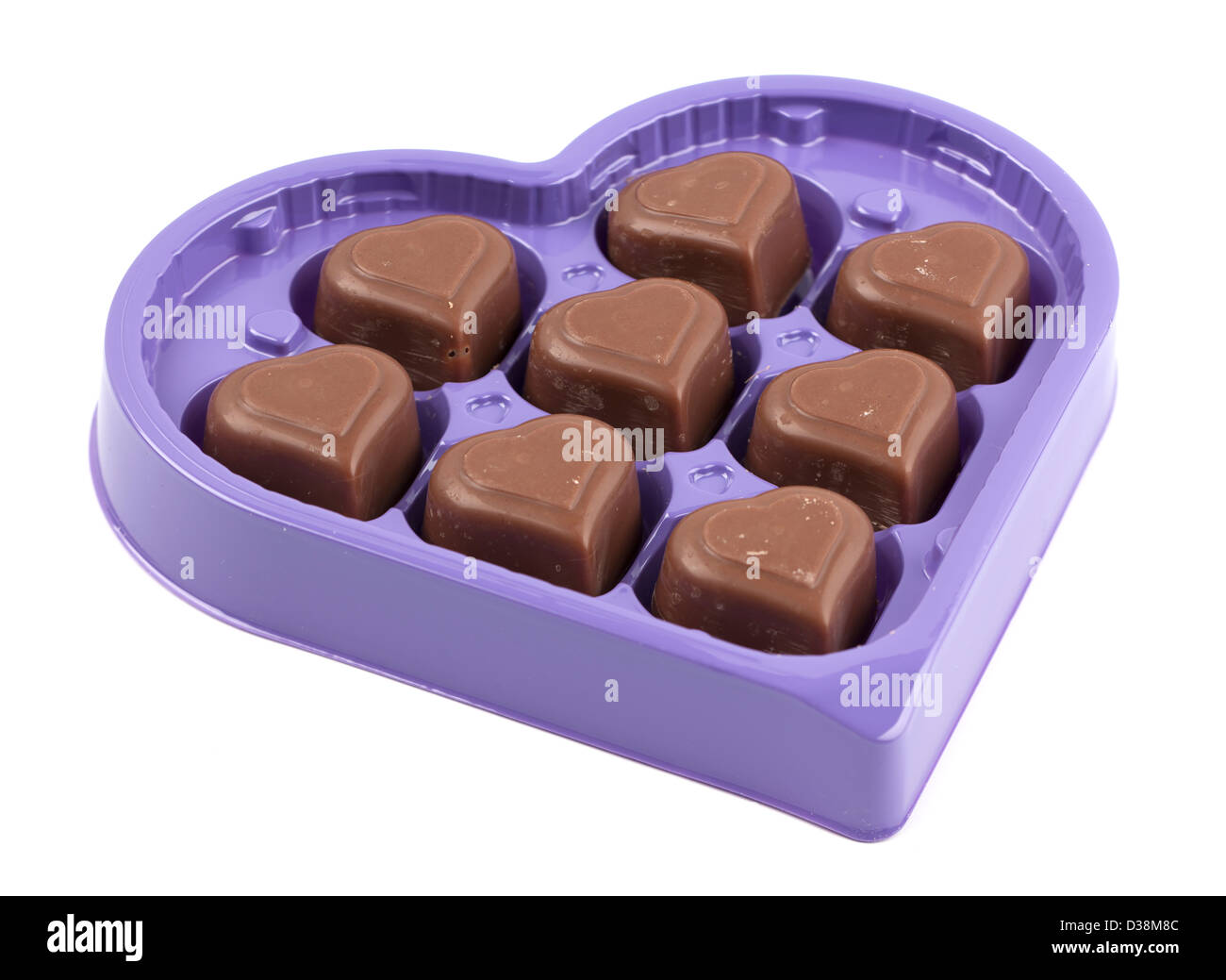 Bandeja en forma de corazón de 8 chocolates en forma de corazón Foto de stock