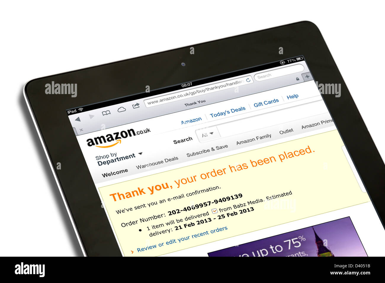 Confirmación de pedido de compras en línea en el sitio web amazon.co.uk vistos en una 4ª generación de Apple iPad tablet pc Foto de stock