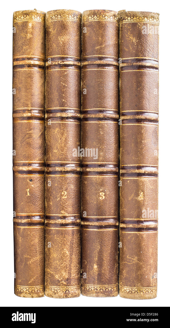 Pila de libros antiguos aislado sobre fondo blanco. Foto de stock