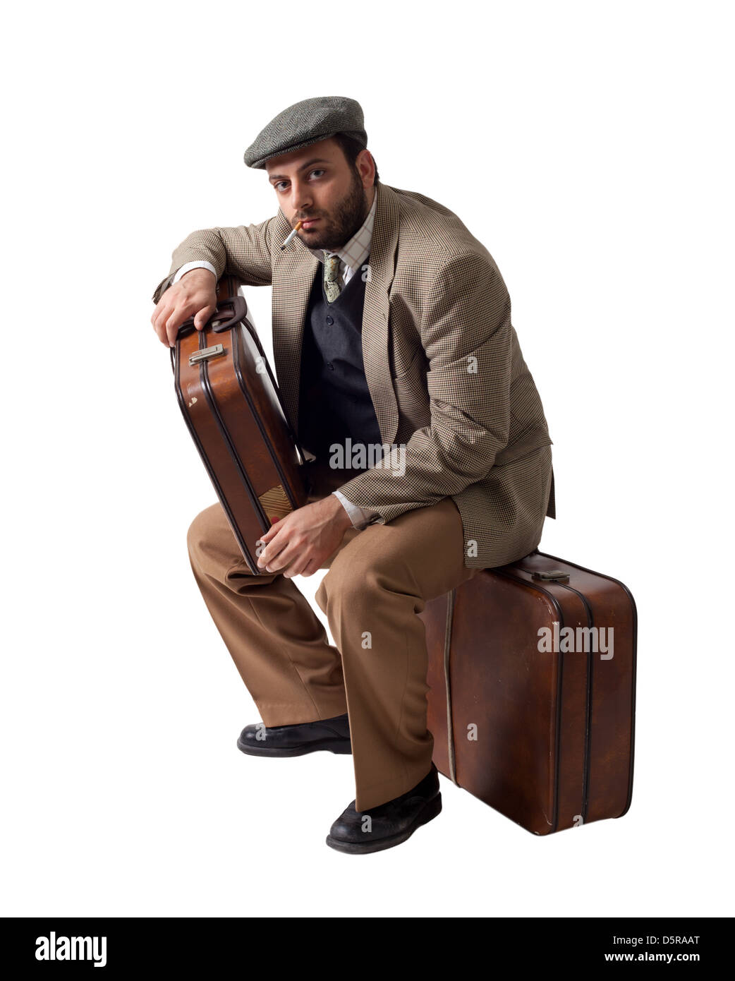 Hombre emigrante con las maletas Fotografía de stock - Alamy