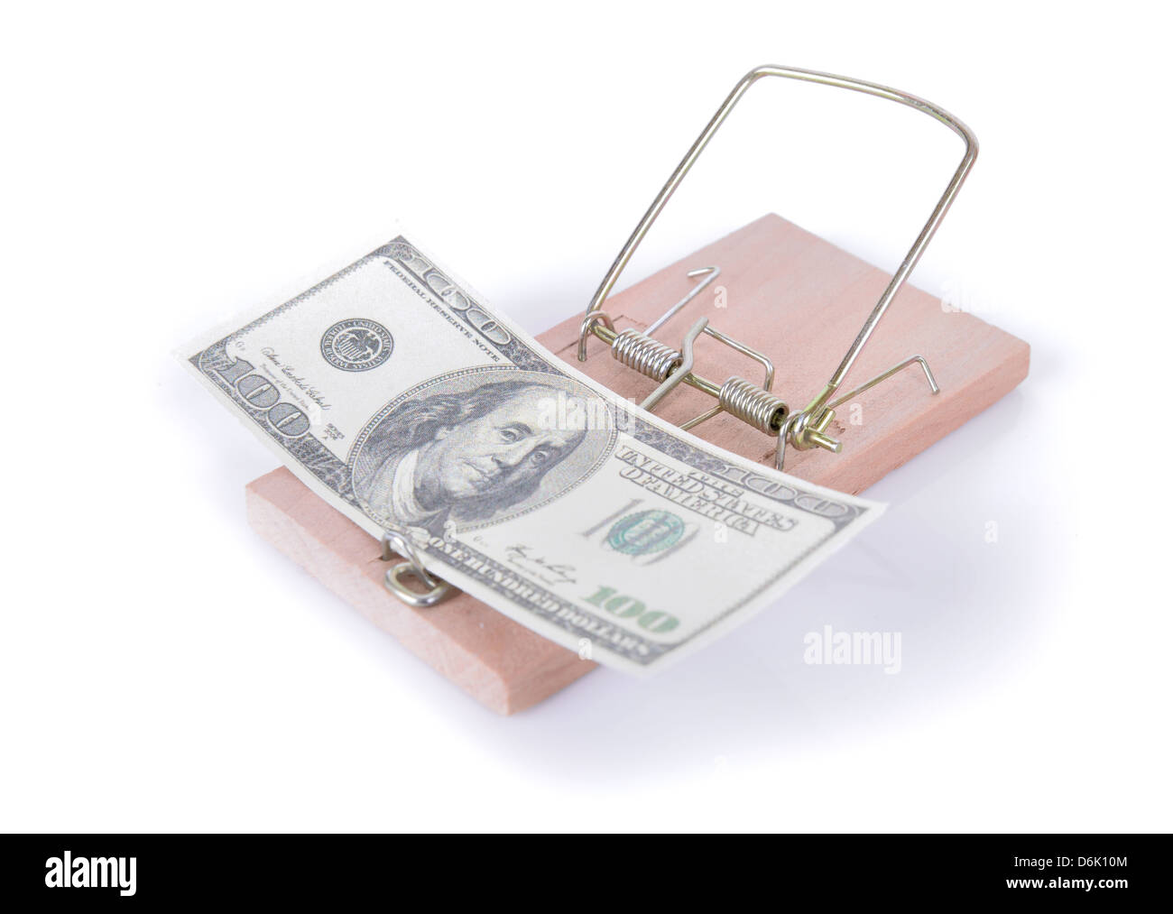 Concepto de dinero trampa, 100 dolares en una trampa Foto de stock