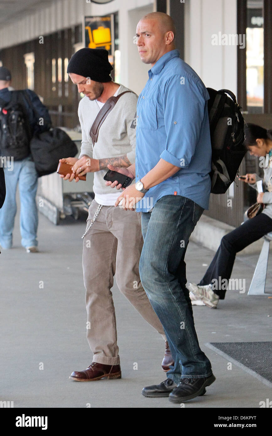 David Beckham llega al aeropuerto de LAX por separado de sus compañeros de equipo LA Galaxy después de un partido de Los Angeles, California - 21.10.11 Foto de stock