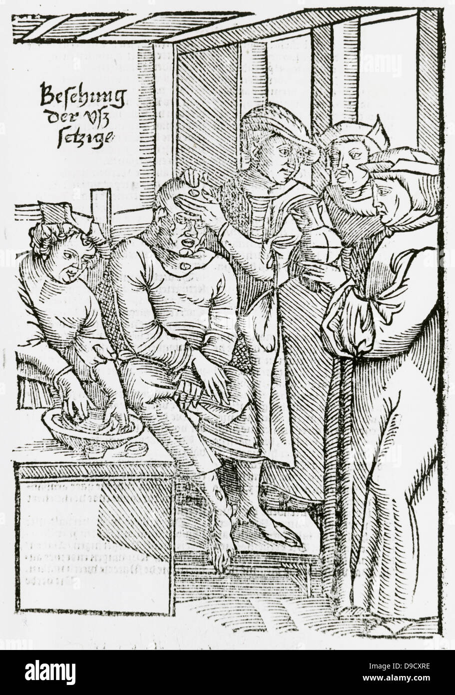 Los médicos examinar a un paciente con lepra. Debido al temor de contraer la lepra por el contacto con un paciente, los leprosos eran considerados impuros y aisladas en hospitales de leprosos. Xilografía, Amsterdam, 1593. Foto de stock