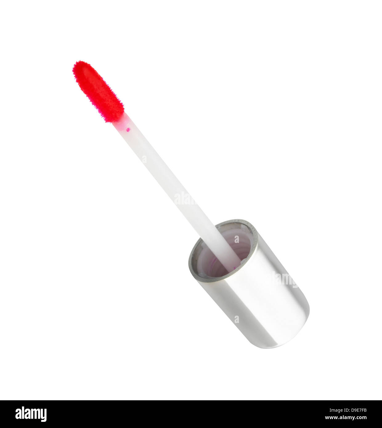 Varita de lip gloss rojo cortado en fondo blanco. Foto de stock