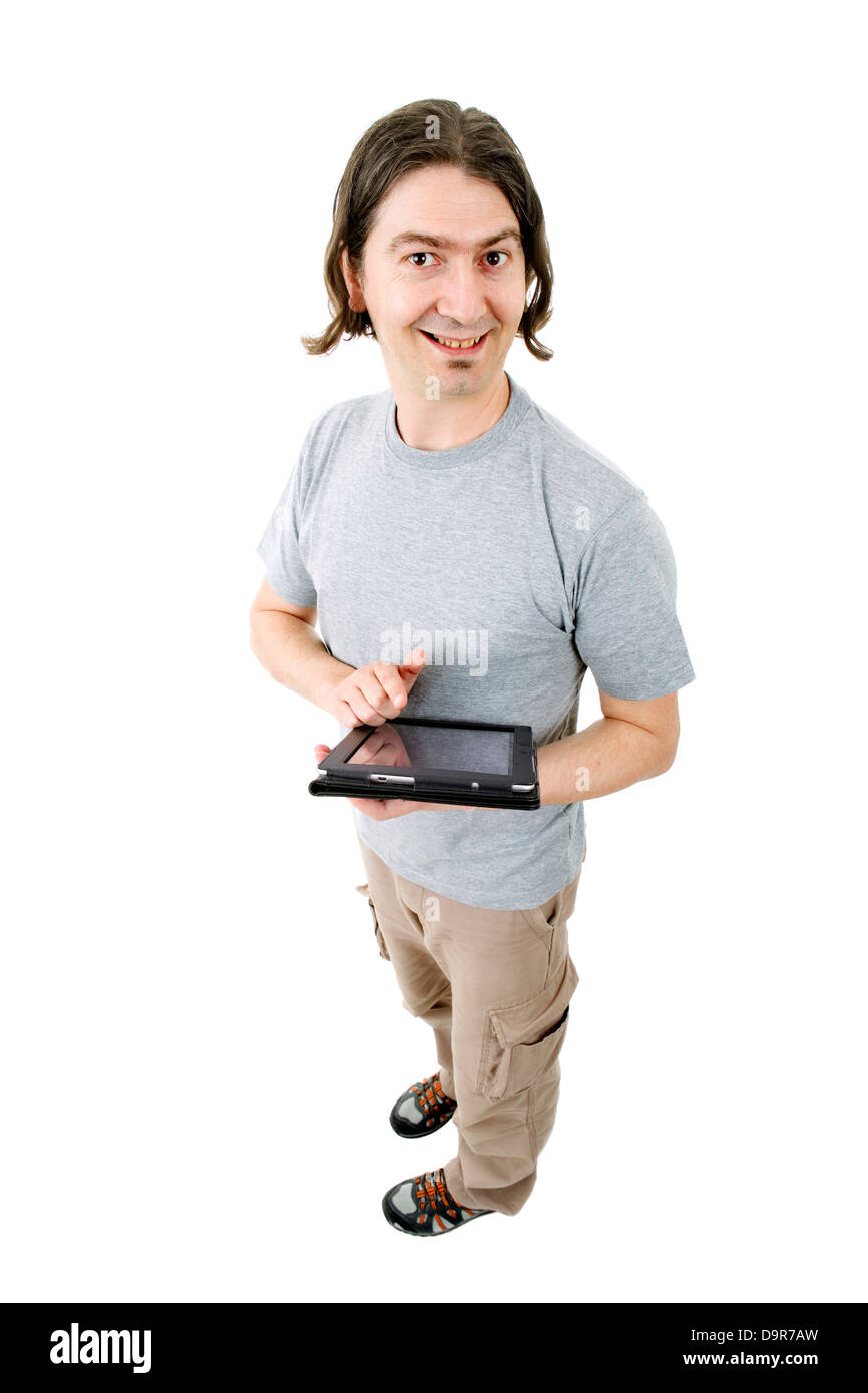 Joven hombre casual con una tableta de cuerpo completo, aislado Fotografía  de stock - Alamy