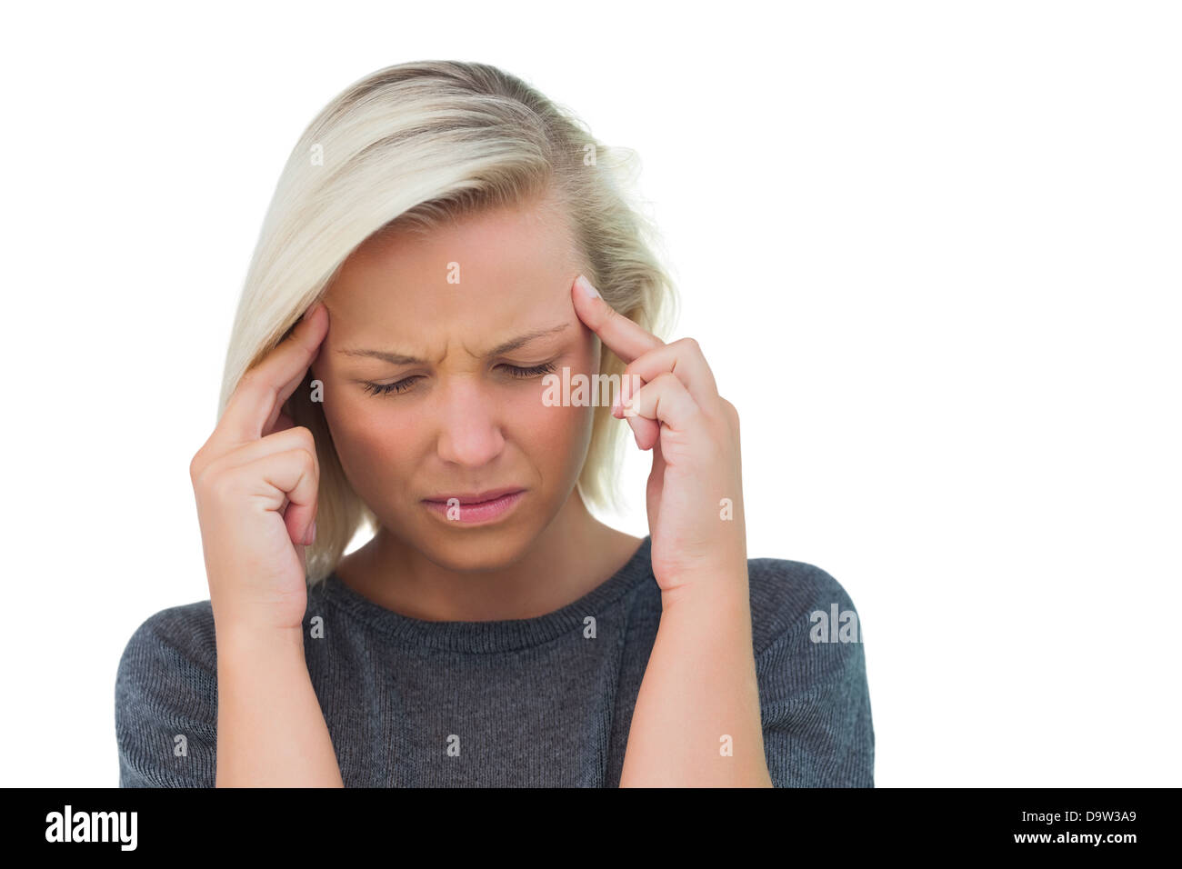 Mujer atractiva con un dolor de cabeza Foto de stock