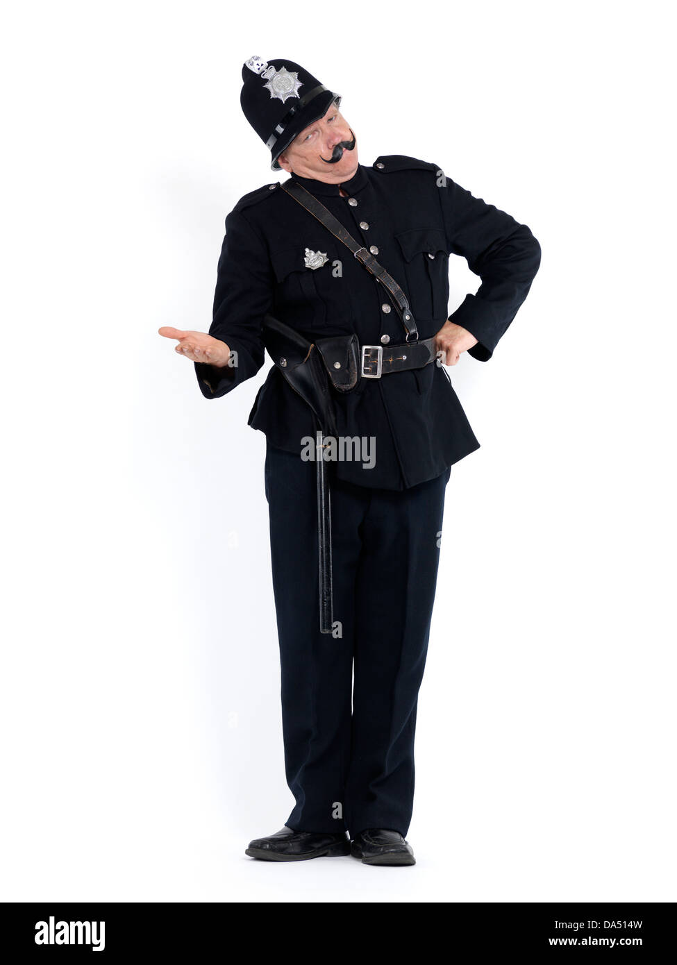 Oficial de policía en vintage uniforme con un brazo estirado y grave expresión exige documentos, humorístico retrato conceptual Foto de stock