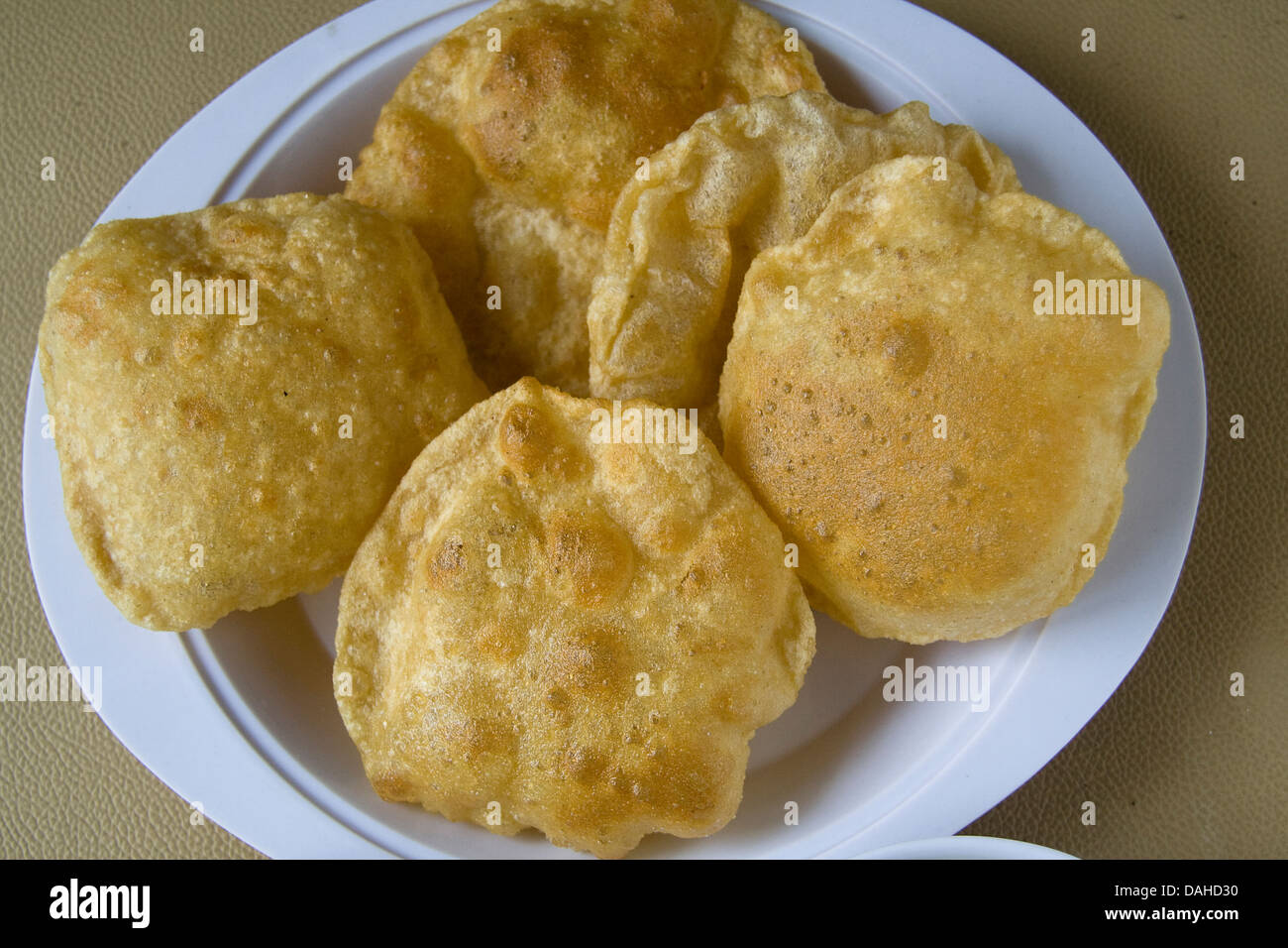 "Puffy" hechas de puré de harina de trigo es un indio deliciosos alimentos Foto de stock