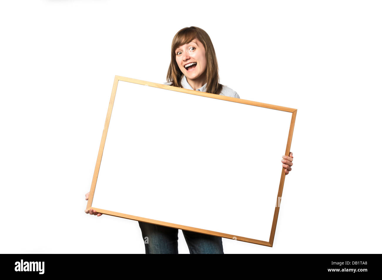 Feliz niña está sosteniendo una pizarra en blanco Fotografía de stock -  Alamy